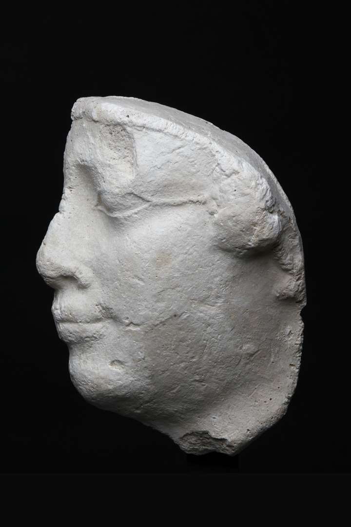 Fragment of a relief depicting a man’s profile
